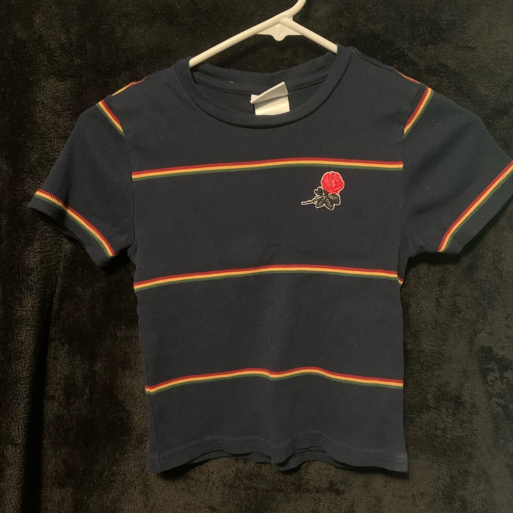 Navy blue striped top with flower